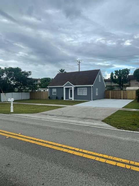 Photo of 421 Kirk Road, Palm Springs, FL 33461 (MLS # B26054364)