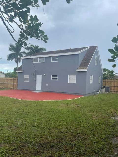 Tiny photo for 421 Kirk Road, Palm Springs, FL 33461 (MLS # B26054364)