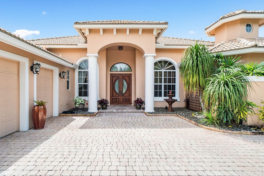Photo of 137 Pembroke Drive, Palm Beach Gardens, FL 33418 (MLS # R11124240)