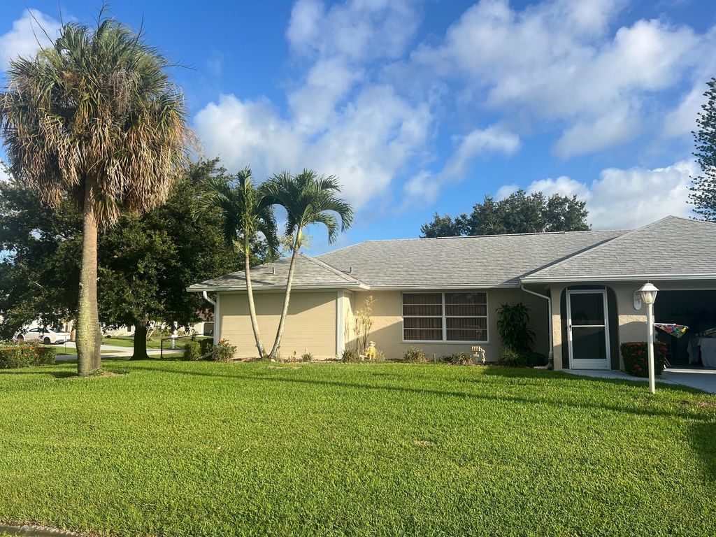Photo of 1350 SE Petunia Avenue, Port Saint Lucie, FL 34952 (MLS # R10997929)