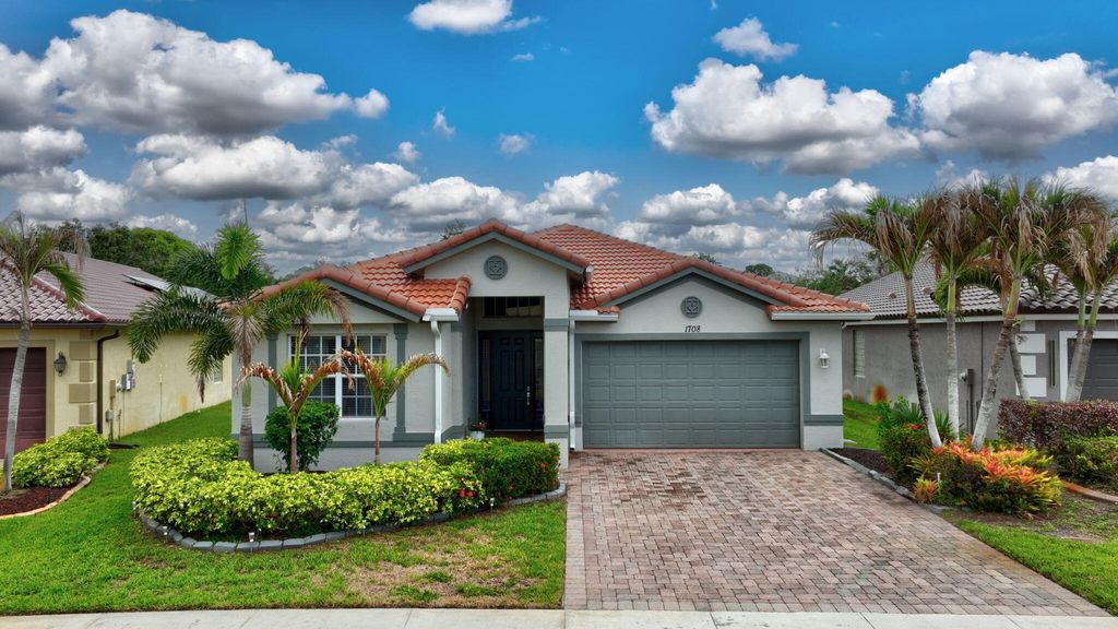 Photo of 1708 SW Jamesport Drive, Port Saint Lucie, FL 34953 (MLS # B26030575)