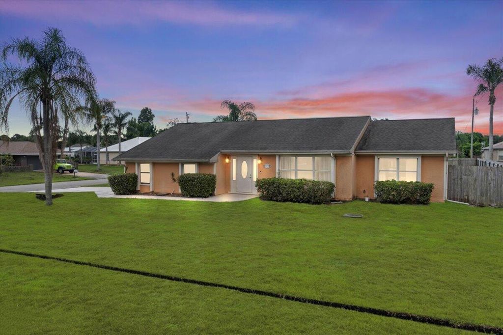 Photo of 2492 SE Rival Avenue, Port Saint Lucie, FL 34952 (MLS # R11000520)