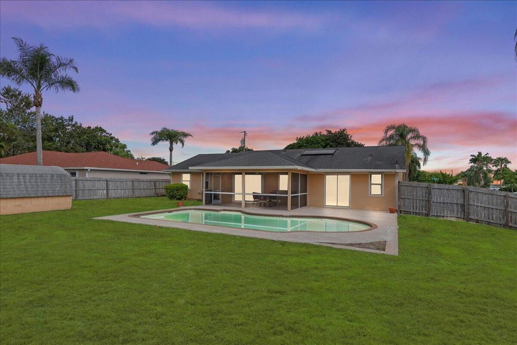 Photo of 2492 SE Rival Avenue, Port Saint Lucie, FL 34952 (MLS # R11000520)