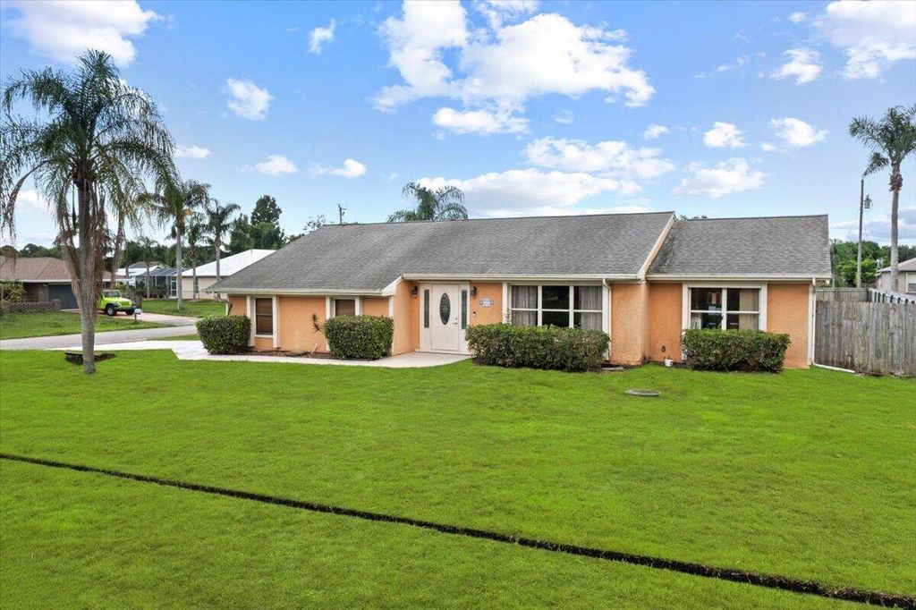 Photo of 2492 SE Rival Avenue, Port Saint Lucie, FL 34952 (MLS # R11000520)