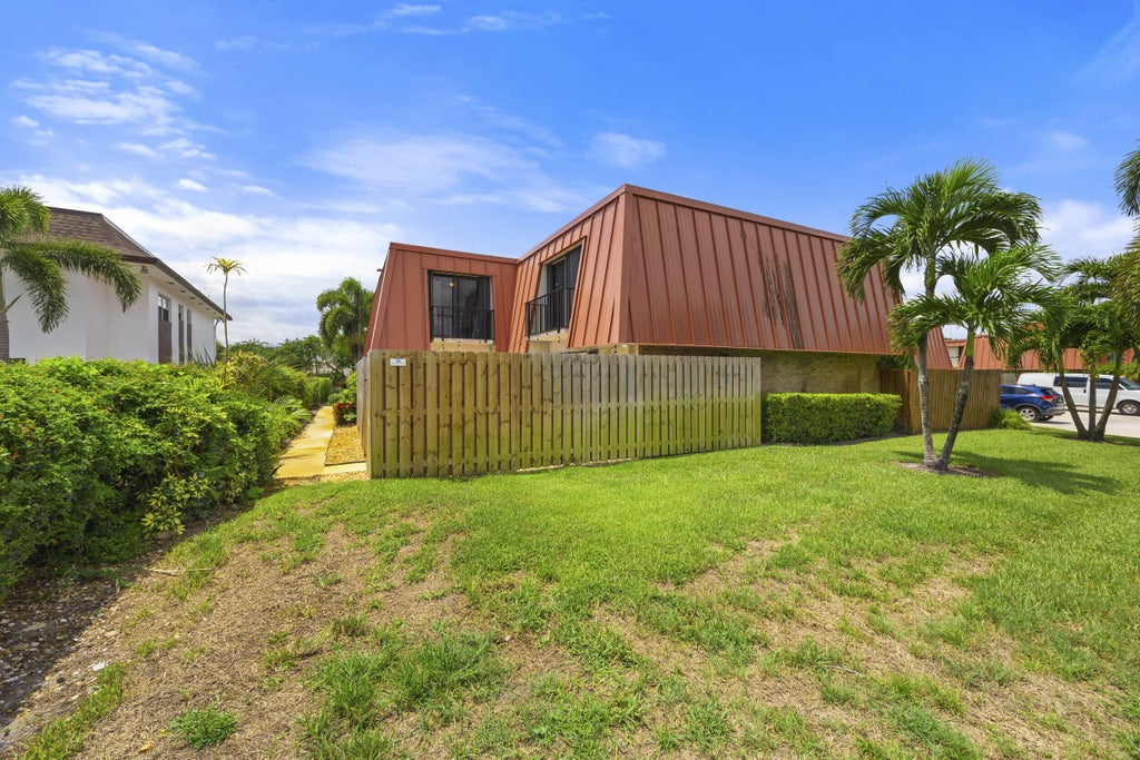 Photo of 3157 Gardens East Drive #D, Palm Beach Gardens, FL 33410 (MLS # R11015058)