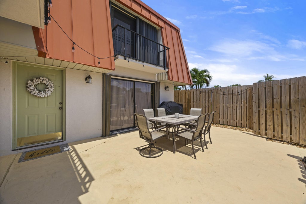 Photo of 3157 Gardens East Drive #D, Palm Beach Gardens, FL 33410 (MLS # R11015058)