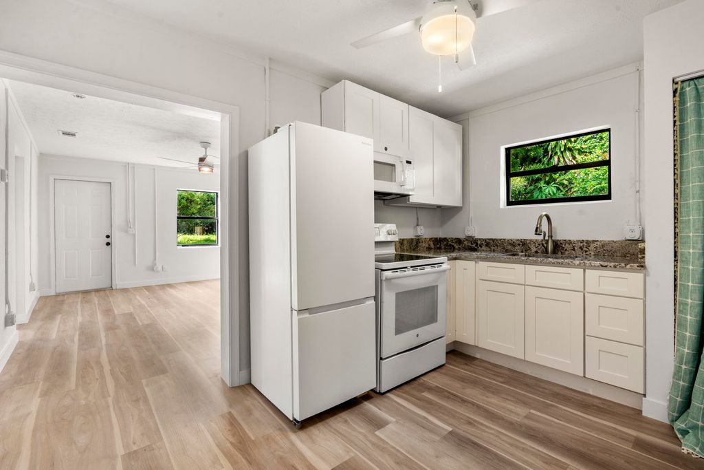 Photo of 8493 SE Date Street, Hobe Sound, FL 33455 (MLS # R11020644)