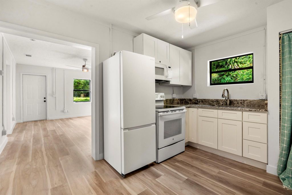 Photo of 8493 SE Date Street, Hobe Sound, FL 33455 (MLS # R11020644)