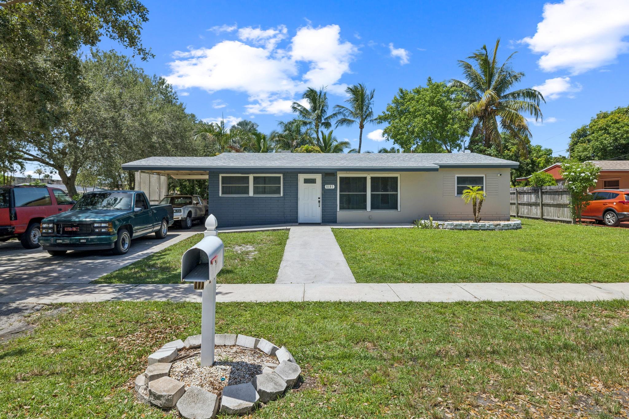 Welcome to 5181 SW 14th St, a beautifully updated 4-bedroom, 2-bathroom home in the heart of Plantation, FL. This charming residence features a spacious open floor plan, modern kitchen with stainless steel appliances, and stylish finishes throughout. Enjoy bright natural light, impact windows, and luxury vinyl flooring. The backyard is perfect for entertaining with a large covered patio and lush landscaping. Conveniently located near schools, parks, shopping, and major highways. No HOA and room for a pool or boat! Don’t miss your chance to own this move-in ready gem in a quiet, family-friendly neighborhood. Schedule your private showing today!