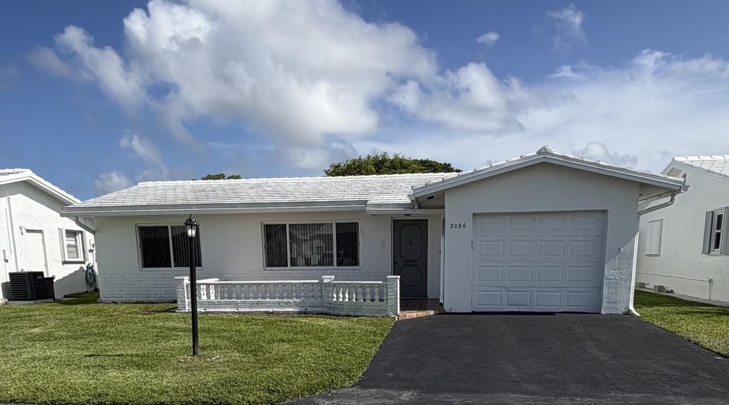 Photo of 2086 SW 12th Avenue, Boynton Beach, FL 33426 (MLS # B26033257)