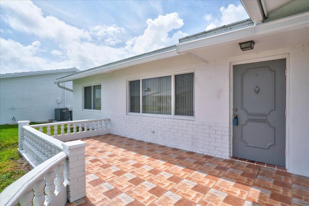 Photo of 2086 SW 12th Avenue, Boynton Beach, FL 33426 (MLS # B26033257)