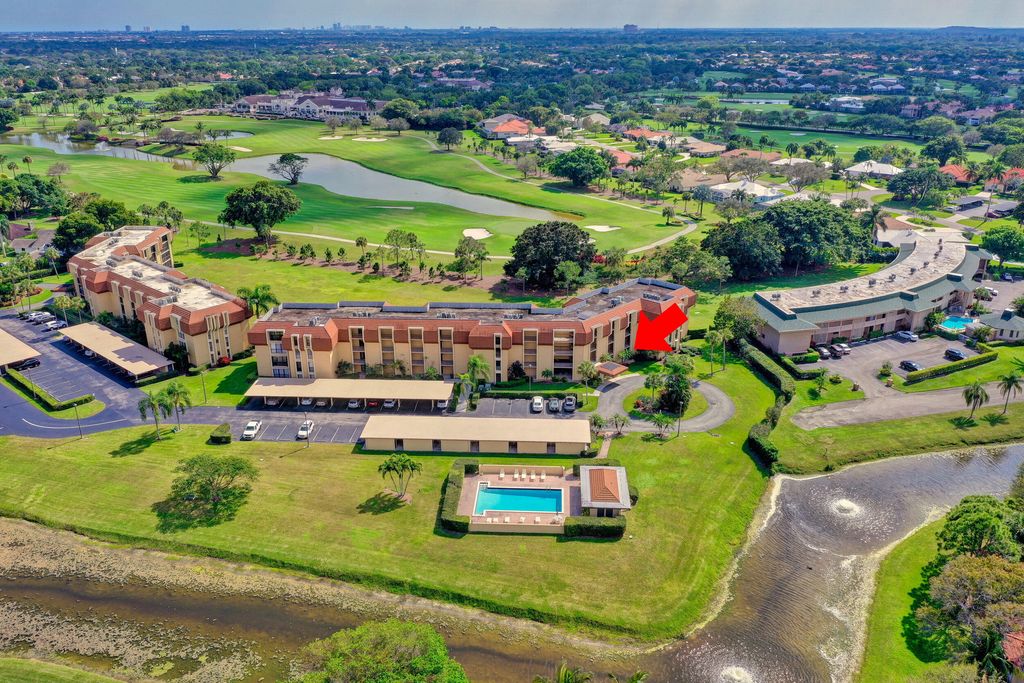 Photo of 5390 Woodland Lakes Drive #102, Palm Beach Gardens, FL 33418 (MLS # R11147621)