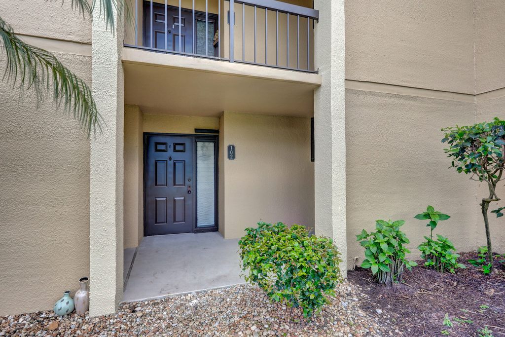 Photo of 5390 Woodland Lakes Drive #102, Palm Beach Gardens, FL 33418 (MLS # R11147621)