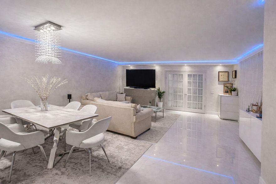 Beautifully renovated corner unit featuring 2 bedrooms and 2.5 bathrooms in the heart of Hollywood. This spacious residence offers an open and bright floor plan with abundant natural light, modern finishes, and updated interiors throughout. Recently renovated kitchen and bathrooms with contemporary cabinetry, countertops, and fixtures. The corner location provides added privacy and extra windows, enhancing the airy feel of the home. Spacious bedrooms with ample closet space and well-designed layout perfect for comfortable living or investment opportunity. Conveniently located near shopping, dining, major highways, beaches, and entertainment. Move-in ready and meticulously maintained.