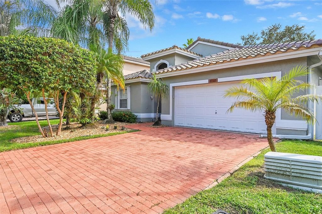 Photo of 8540 NW 46th Drive, Coral Springs, FL 33067 (MLS # F10529401)