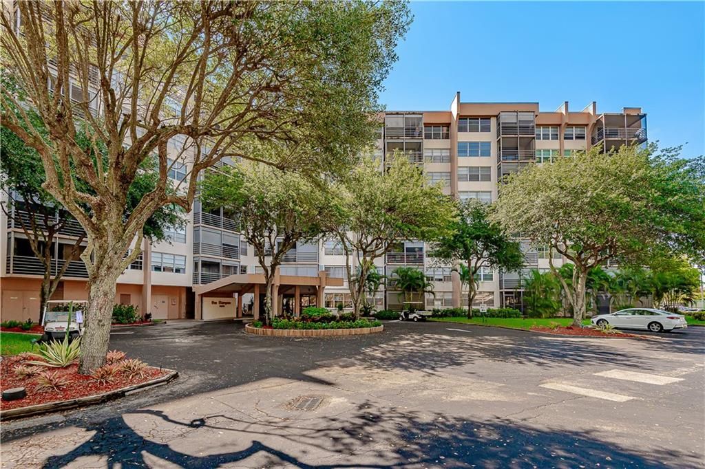 Photo of 1300 Saint Charles Pl #L-10, Pembroke Pines, FL 33026 (MLS # F10329363)