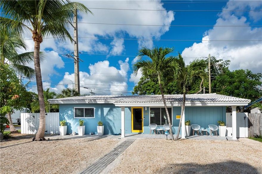 They say location is key! Stylish and upgraded 3/2 corner  home only a few steps to Wilton Drive restaurants, shops, grocery, pharmacy and amazing nightlife! Beautiful remodeled kitchen with new counters and backsplash, super nice stainless appliances and a bar/island. A/C system is only 5 years young. There are tile floors throughout, impact windows and doors all around, new front porch and back lanai flooring, five year old privacy fence ,wireless security, Ring doorbell and spotlight cameras, Nest thermostat, two wi-fi switches for Alexa, Google home, etc. The third bedroom has it's own exit. The exterior is freshly painted and the roof has been pressure washed. New landscaping and the lanai is screened for easy entertaining. You new home awaits!