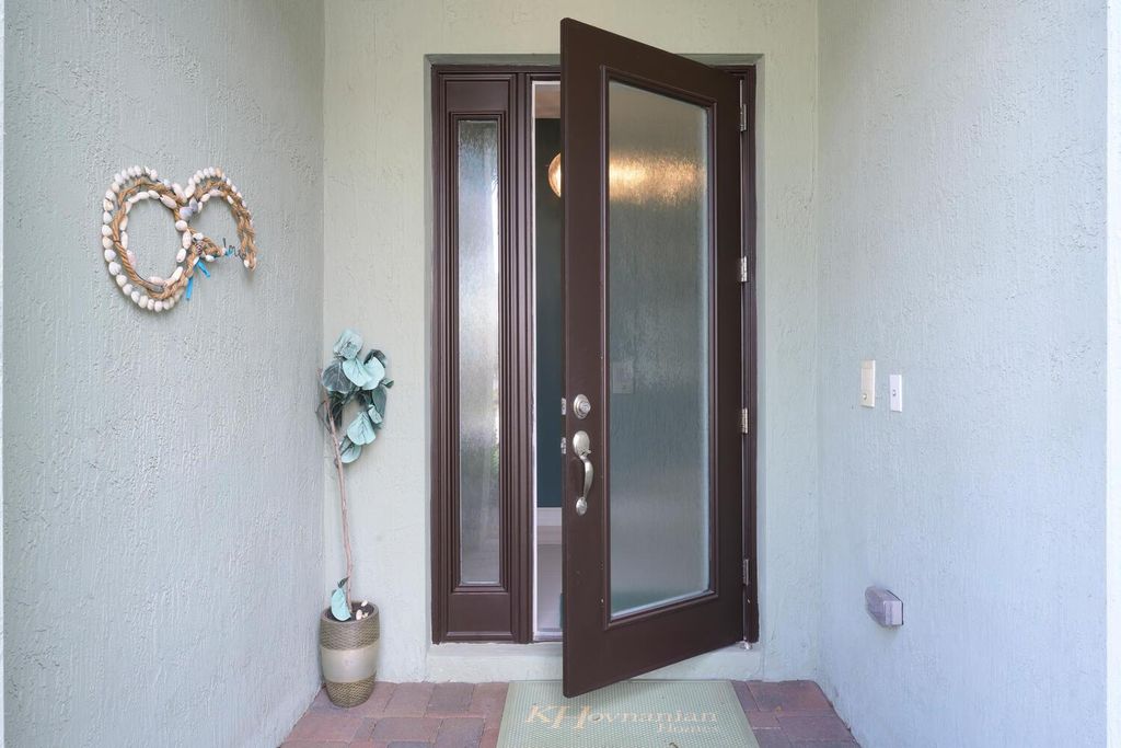 Photo of 1932 Juno Landing Lane, North Palm Beach, FL 33408 (MLS # R10961031)