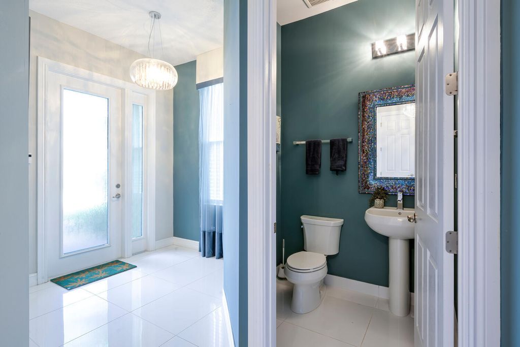 Photo of 1932 Juno Landing Lane, North Palm Beach, FL 33408 (MLS # R10961031)