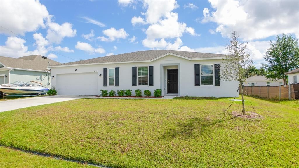 Photo of 2117 SW Trenton Lane, Port St Lucie, FL 34984 (MLS # R10880564)