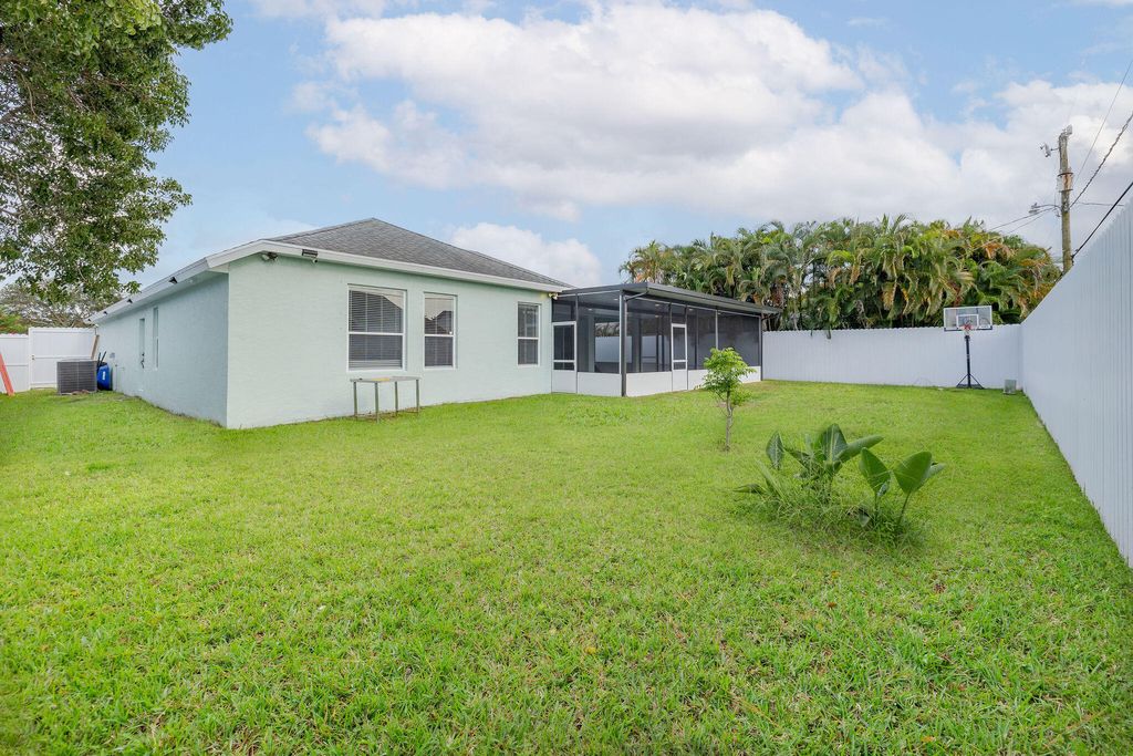 Photo of 728 SW Avens Street, Port Saint Lucie, FL 34983 (MLS # R11021359)