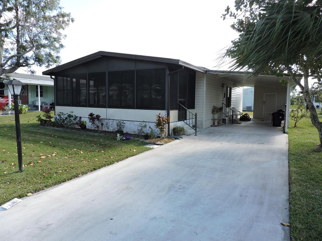 Photo of 4684 SE Corkwood Terrace, Stuart, FL 34997 (MLS # R11048943)
