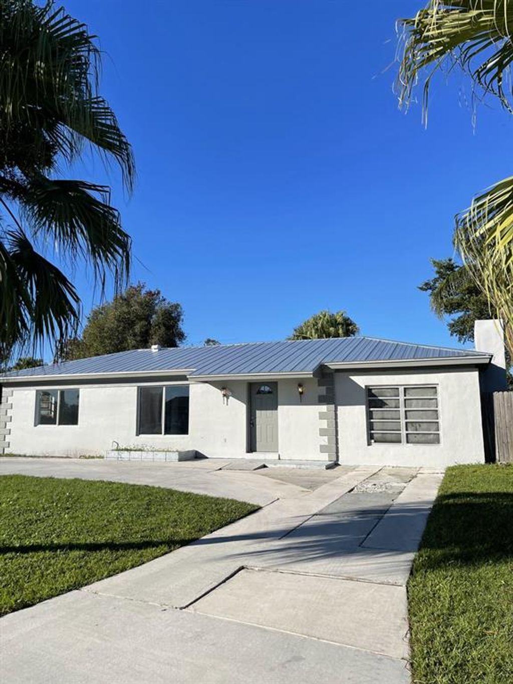 Photo of 619 Ash Street, Port Saint Lucie, FL 34952 (MLS # R10766220)