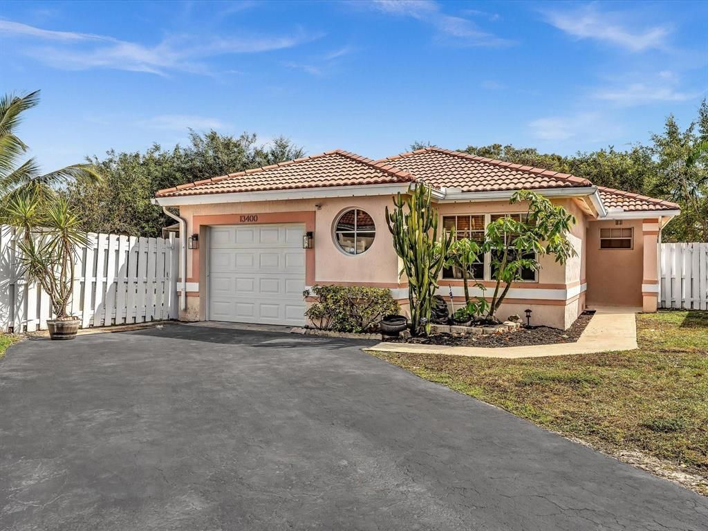 Photo of 13400 NW 5th Court, Plantation, FL 33325 (MLS # B26022699)