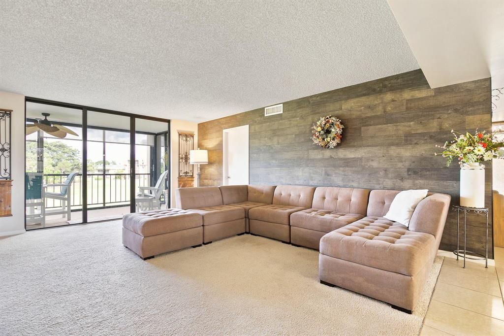 Photo of 5350 Woodland Lakes Drive #212, Palm Beach Gardens, FL 33418 (MLS # R10812645)