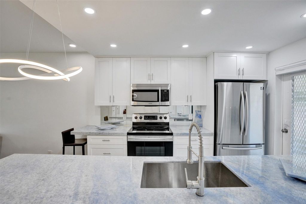 Photo of 101 NE 19th Avenue #110, Deerfield Beach, FL 33441 (MLS # F10442157)