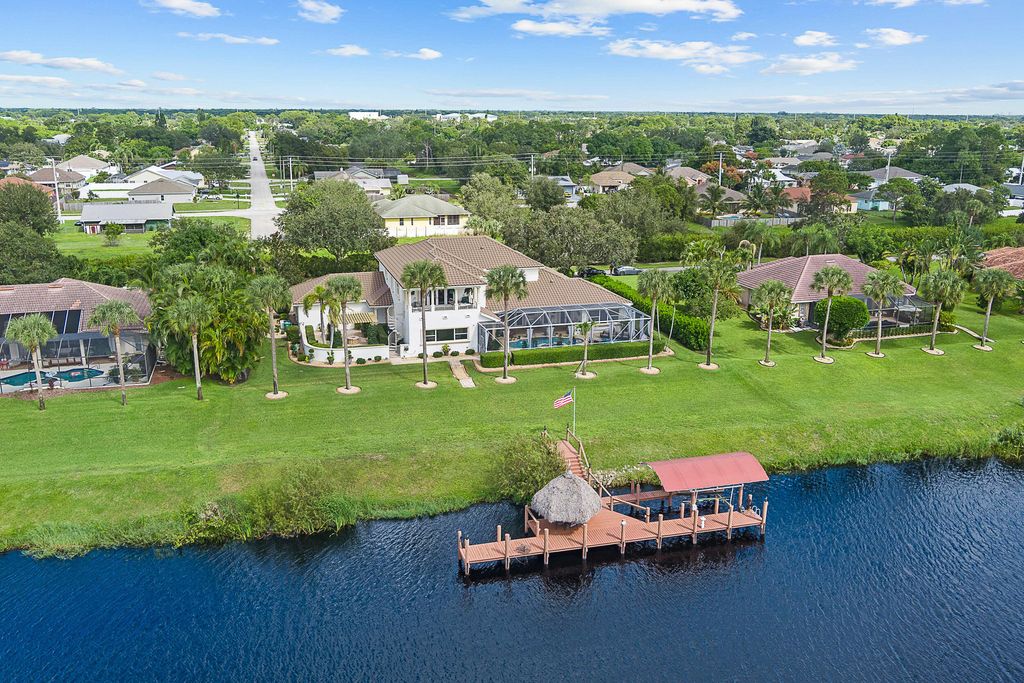 Photo of 2618 SW River Shore Drive, Port Saint Lucie, FL 34984 (MLS # R11133915)