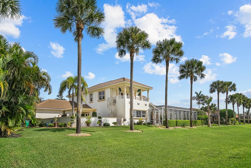 Welcome to your own private paradise in the heart of Port St. Lucie. This stunning custom Mediterranean-style CBS estate offers the ultimate in luxury waterfront living with over 150 feet of frontage along the C-24 Canal. Designed for boating enthusiasts & entertainers alike, the property features a private dock with boat lift, a tiki hut perfect for sunset gatherings, & quick access to the nearby public boat ramp. This five-bedroom, five-bath residence offers an exceptional floor plan with a first-floor guest suite, home office, family room, dry bar, balcony, residential elevator, & a three-car garage, all thoughtfully designed for comfort, functionality, & elevated Florida living. A screened pool & spa create a true resort-style outdoor retreat, complemented by a summer kitchen with grilling station, cabana bath, fire-pit area, & lush tropical landscaping. Inside, soaring ceilings & travertine floors set the tone for refined living. The chef's kitchen features dual sinks, dishwashers, ovens, refrigerators, an eight-burner gas cooktop, granite countertops, wine coolers, icemaker, & generous prep space. The primary suite offers dual walk-in closets, a sitting area, & a spa-inspired bath. Additional highlights include impact windows & doors, Taylor foam wall insulation, Icynene ceiling insulation, surround sound, & central vacuum. Located in the gated enclave of South River Shores with low HOA fees, minutes to the Turnpike, shopping, dining, & Tradition.