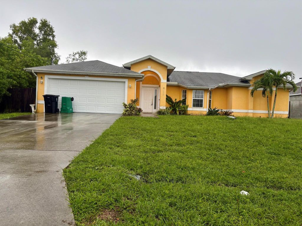 Photo of 550 SW College Park Road, Port Saint Lucie, FL 34953 (MLS # R11120178)
