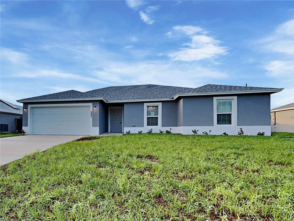 Photo of 982 SW Mcelroy Ave Ave, Port Saint Lucie, FL 34953 (MLS # F10350667)