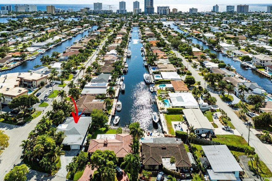 Welcome to 2200 SE 9th Street, a masterpiece where coastal elegance meets modern luxury in the prestigious Pompano Isles. This reimagined waterfront estate has been meticulously upgraded with wellness-focused enhancements and bespoke finishes that define the South Florida lifestyle.Every detail has been curated for comfort and peace of mind--brand-new seawall, full impact glass, generator, complete cast iron pipe replacement, and a whole-home water filtration system. Interiors boast exquisite new tile flooring, a climate-controlled wine cellar, and spa-inspired bathrooms, including a primary retreat with a rainfall steam shower.Outdoors, experience resort-style living with a heated and cooled pool, cold plunge spa, and private dock.