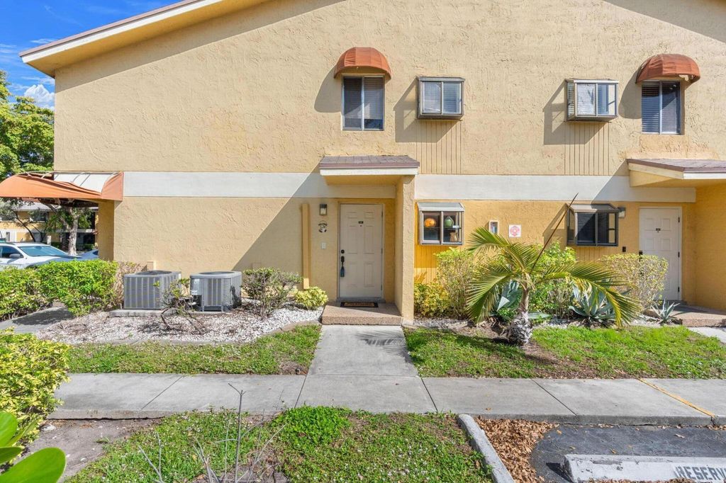 Photo of 3053 N Oakland Forest Drive #102, Oakland Park, FL 33309 (MLS # F10556794)