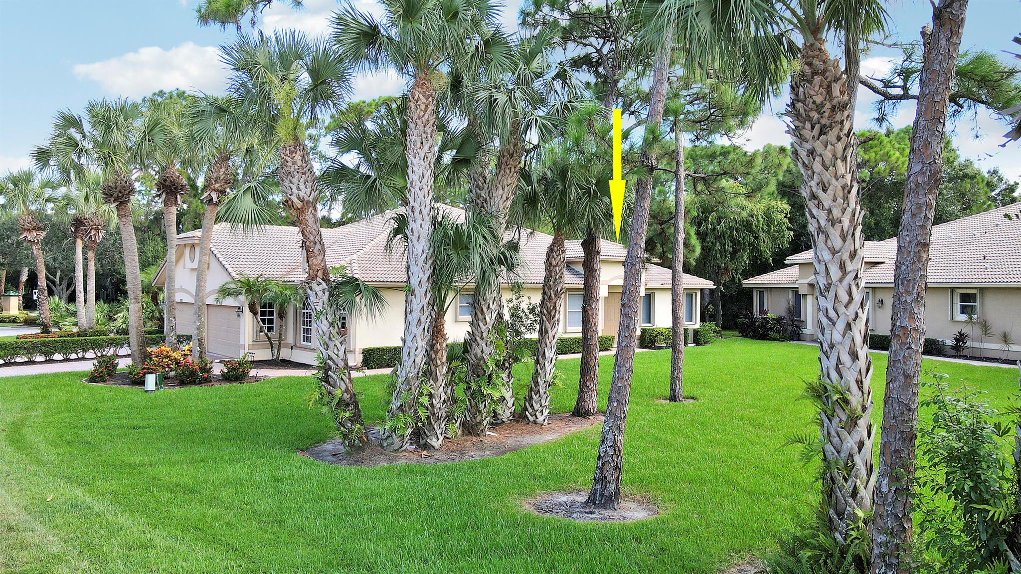 LOCATION, LOCATION, LOCATION! PRIVACY ABOUNDS WITH THIS OVERSIZED CORNER LOT! Don't miss this 2BR+Den/2BA/2CG Hyannis villa in the Willow Pines subdivision of PGA Village. Walking distance to the Willow Pines pool and set on an oversized lot with no direct side neighbor! Special features of this home include accordion shutters throughout, NEW AC & WH in 2024, crown molding, tray ceilings, neutral interior paint, spacious den with pocket doors (easily used as a third bedroom) and more. This ever popular floor plan includes a large living area and kitchen with wraparound breakfast bar seating. The master suite has dual closets, private ensuite with dual vanities and slider doors leading out to the patio. Split bedrooms ensure plenty of privacy.