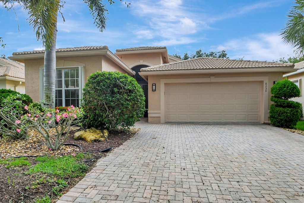 Photo of 8250 Sandpiper Glen Drive, Lake Worth, FL 33467 (MLS # R10905308)
