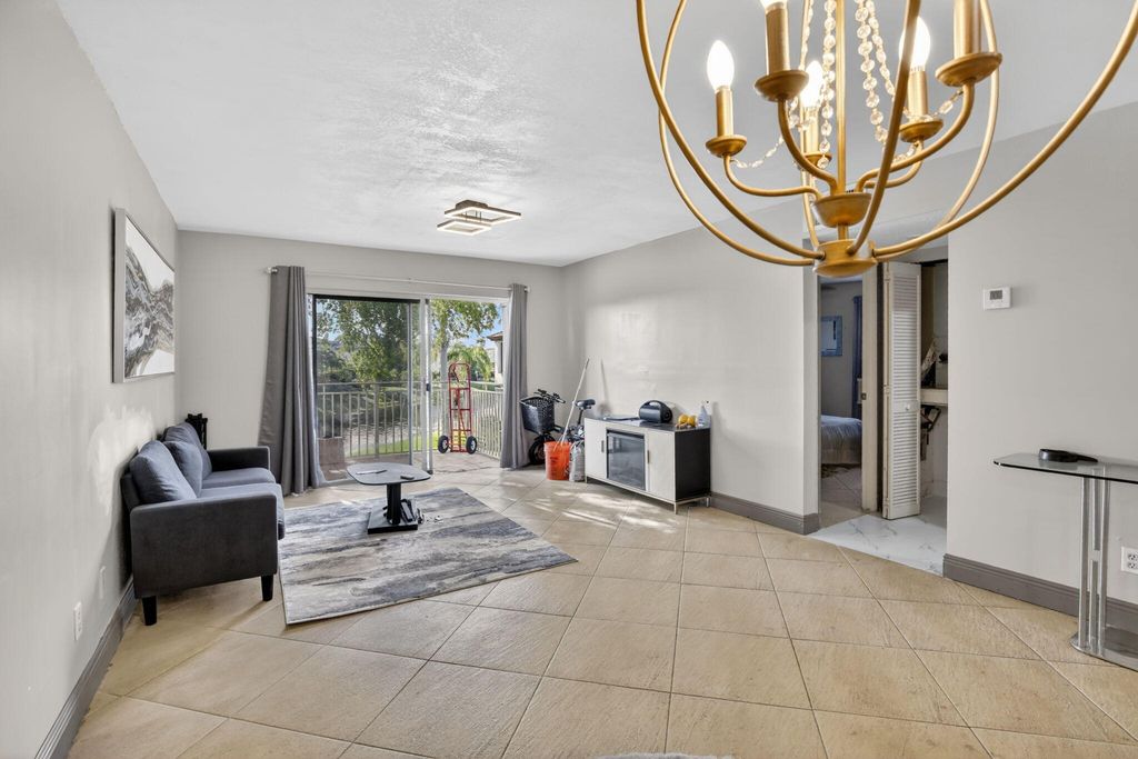 Photo of 1250 SW 113th Terrace #201, Pembroke Pines, FL 33025 (MLS # B26009328)