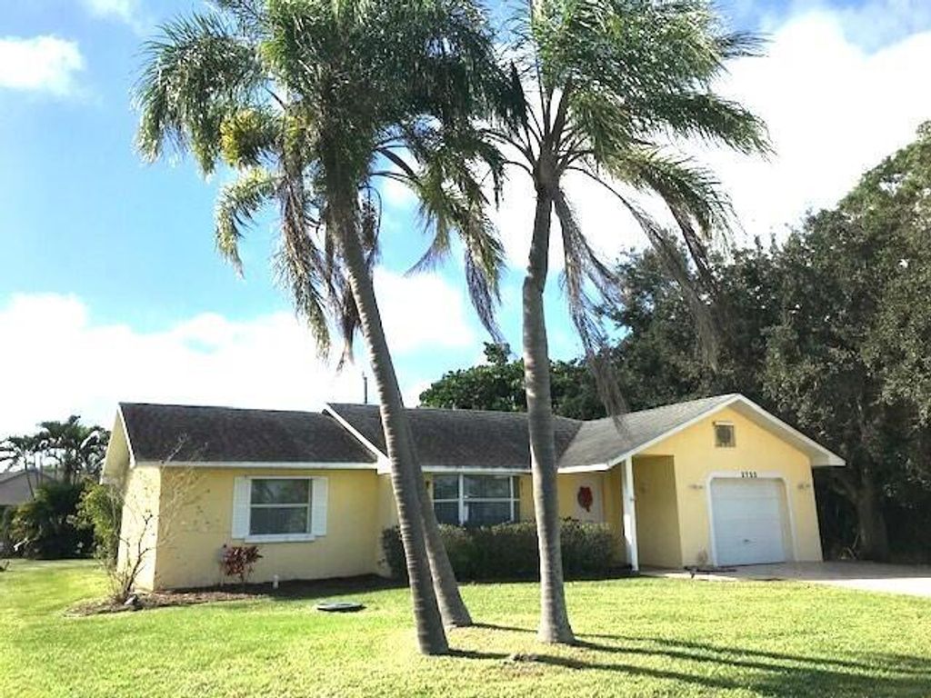 Photo of 2722 SE Worrell Avenue, Port Saint Lucie, FL 34952 (MLS # R10943839)