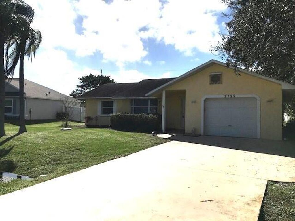 Photo of 2722 SE Worrell Avenue, Port Saint Lucie, FL 34952 (MLS # R10943839)