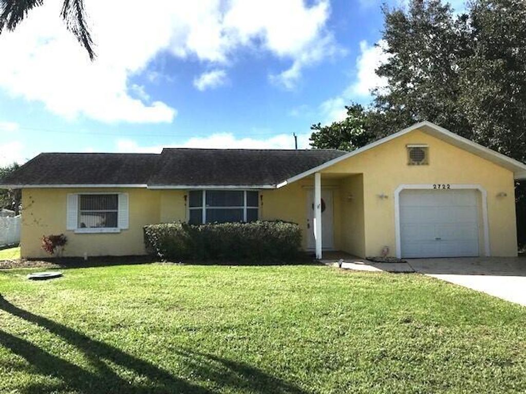 Photo of 2722 SE Worrell Avenue, Port Saint Lucie, FL 34952 (MLS # R10943839)
