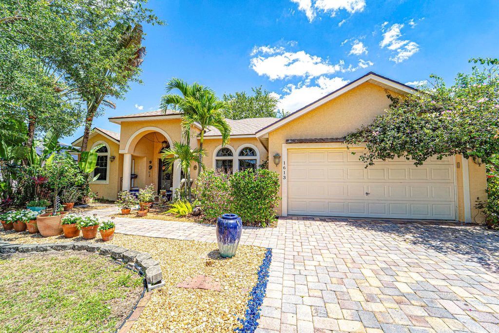 Photo of 1613 SW Cecelia Lane, Port Saint Lucie, FL 34953 (MLS # R11091266)