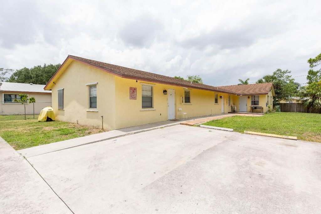 Photo of 3831 7th Avenue N, Palm Springs, FL 33461 (MLS # R10988082)