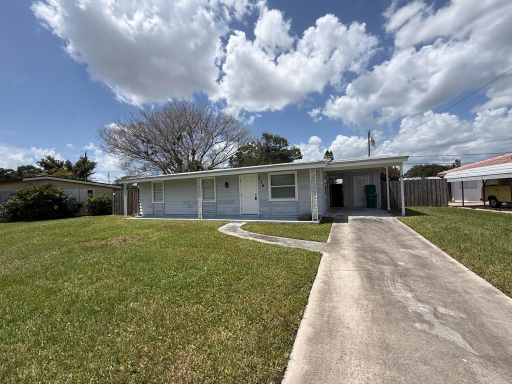 Photo of 116 SE CAMINO Street, Port Saint Lucie, FL 34952 (MLS # B26068106)