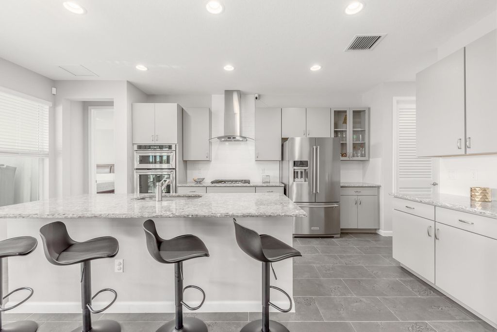 Photo of 11517 SW Lyra Drive, Port Saint Lucie, FL 34987 (MLS # R10953751)