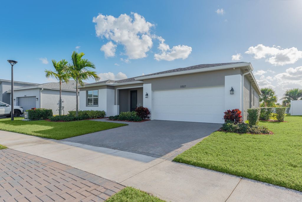 Photo of 11517 SW Lyra Drive, Port Saint Lucie, FL 34987 (MLS # R10953751)