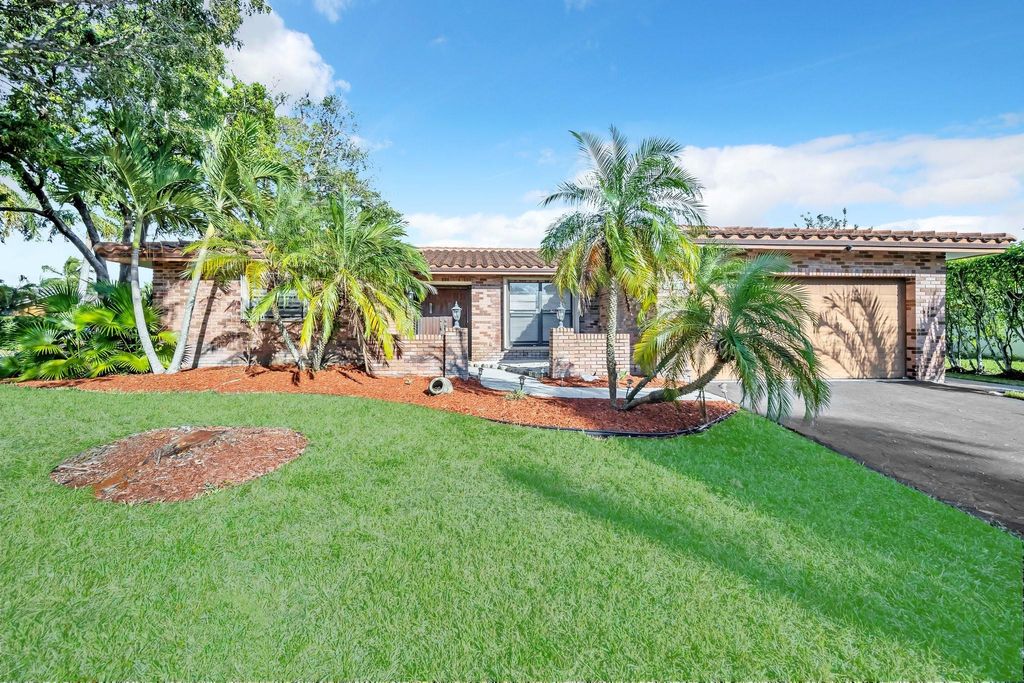 Photo of 2877 NW 122nd Avenue, Coral Springs, FL 33065 (MLS # F10490704)