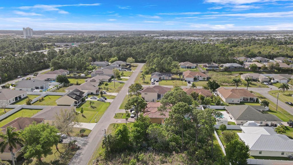 Photo of 2241 SW Elmwood Avenue, Port Saint Lucie, FL 34953 (MLS # R11148373)