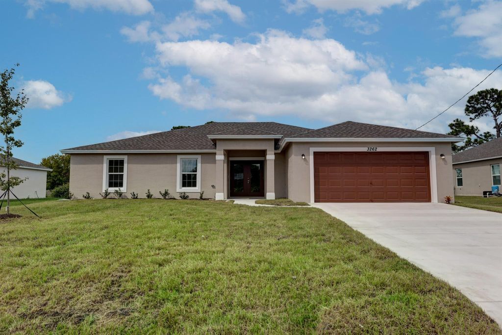 Photo of 3262 SW Martin Street, Port St Lucie, FL 34953 (MLS # R10924955)